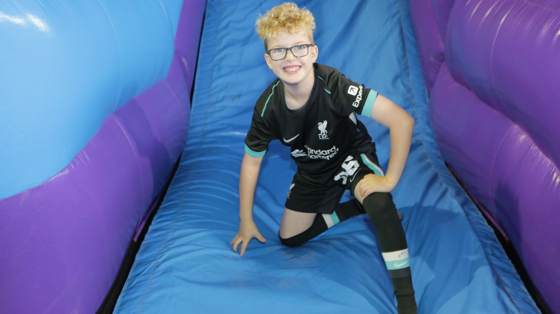 A young boy enjoys one of the available activities.