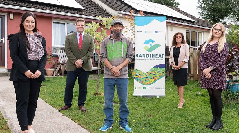 Mark and Handiheat team: Pictured from left is Housing Executive Patch Manager, Kirsty Dixon, Handiheat Project Lead, Robert Clements, tenant, Mark Kiernan, Project Manager, Catherine Savage and Senior Admin Assistant Amy Lewis.