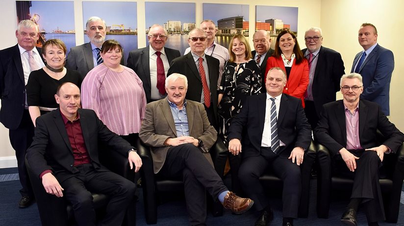 Members of the Housing Executive board, pictured with members of our senior management team. A number of board members have been reappointed by the Minister for Communities