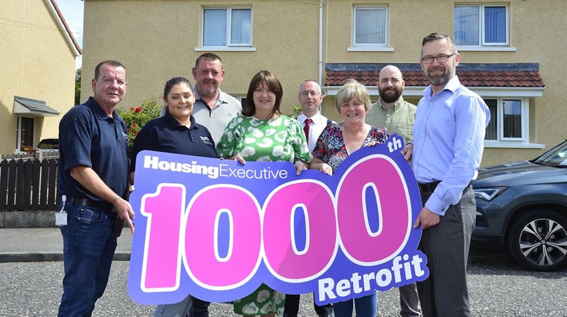 Marking the occasion in Portadown are: front row, l-r: Noel McCann and Emma Sharkey, Housing Executive, Nicole Lappin, Housing Executive Chair, Catherine Heron, resident, and Paul Price, Department for Communities. Back row, l-r, Stephen Robb, IRS Scotland, David Palmer, Housing Executive, and Mark Lee, Department for Communities.