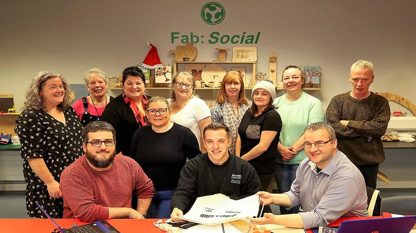 Fab:Social manager Rachel Duffy (back right) with the budding artists. Patrick Duddy and John Ferry, Housing Executive (front left and middle) with Darren Kirby from Liberty Consortium (front right)