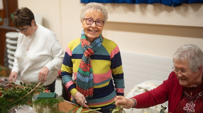 Members of Balnamore Community Association enjoying a wreath-making workshop supported by the Housing Executive are community members, left to right, Joyce Archibald, Valerie Davis, and Hessie Davis.