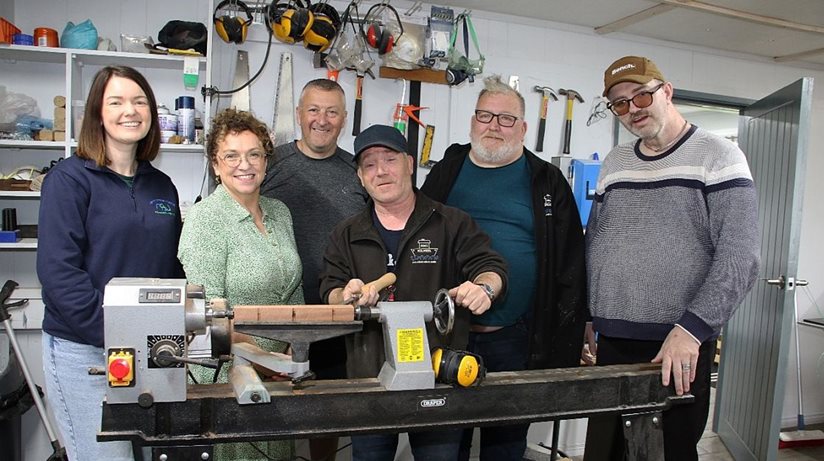  Jennifer Clements, Activities Co-Ordinator at Newry Street Unite Community Centre, welcomes Josephine Morgan from the Housing Executive on a visit to Hillside Men’s Shed to see how the lathe the sponsored has helped them. David Hunter, John Rowley Vice Chairperson, Willie McLoughlin Chairperson and Michael Morgan Hillside Men’s Shed Kilkeel. 