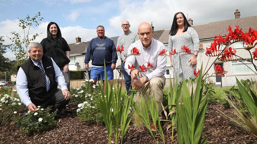 Admiring the West Winds estate facelift are Victor Watson, ID Verde, Cathy Wright, Housing Executive, Billy Sproule, West Winds Development Association, Gary Hilliard and Owen Brady, Housing Executive, and Julie McGowan, West Winds Development Association.