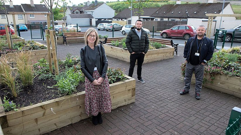 From left to right: Hilary Canning, Housing Executive Team Leader, J P McCloskey, Chairperson of Foreglen Development Group and Martin Wheeler, Housing Executive Grounds Supervisor.