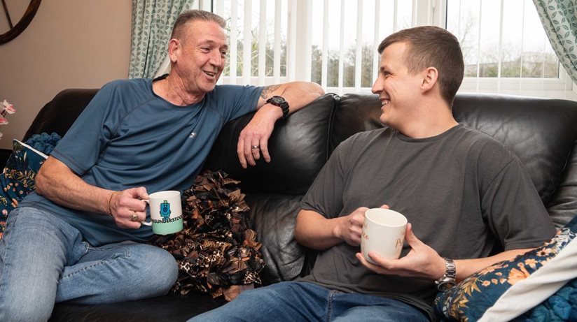 A cuppa in comfort…David Moore, resident of Newpark estate in Antrim (left) talks about his savings on heating bills with Housing Executive’s Patch Manager David Egner having become one of fifty-five homes to benefit from a major £1million Housing Executive Retrofit Scheme investment in the area.