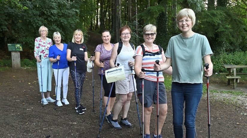Housing Executive Area Manager Sharon Crooks with members of Granaghan & District Women’s Group taking part in a Nordic Pole Walking session at Garvargh Forest Trails, as part of activities promoting health and well-being. 