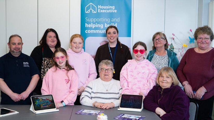 Gareth Doran, Housing Executive Good Relations Officer, Causeway is joined by members of Millburn Community Development Group who delivered a creative, digital learning programme for young people aged 9–16 years. The group received a Community Involvement Grant of £2058 to help with the project.