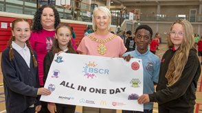 Housing Executive Good Relations Officer Lisa Hull with Belfast Mayor Tracy Kelly and (from left) Kristen McCartney (Blythefield PS), Zara Gourley (St. Malachy's PS), Kederick Odure (Fane Street PS), and Lacey Bather (Taughmonagh PS)