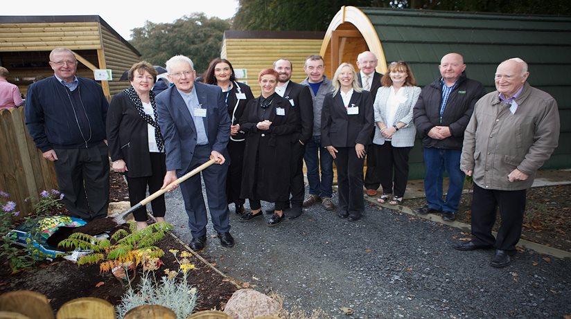 Community and voluntary workers with the Chairman of Strabane Community Project, Fr Boland at the official opening of the Strabane Community Project Garden and Allotments. 