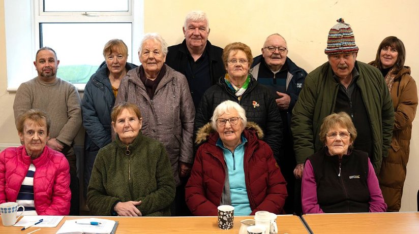 What’s the story?…Members of the Young at Heart Group in Ballintoy enjoy a storytelling session led by Stephen O’Hara as part of a programme of activities funded by a Housing Executive community grant worth £2,120.
