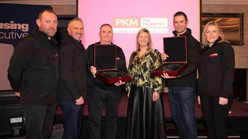 Well deserved: Grainia Long, Chief Executive (centre) with winners PK Murphy, who won the Health & Safety Contractor of the Year Awards for both Planned Maintenance and Response Maintenance.