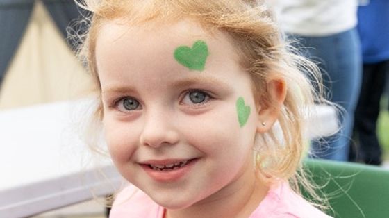 A beautiful smile from three-year-old Sophia Madine as she gets her face painted.