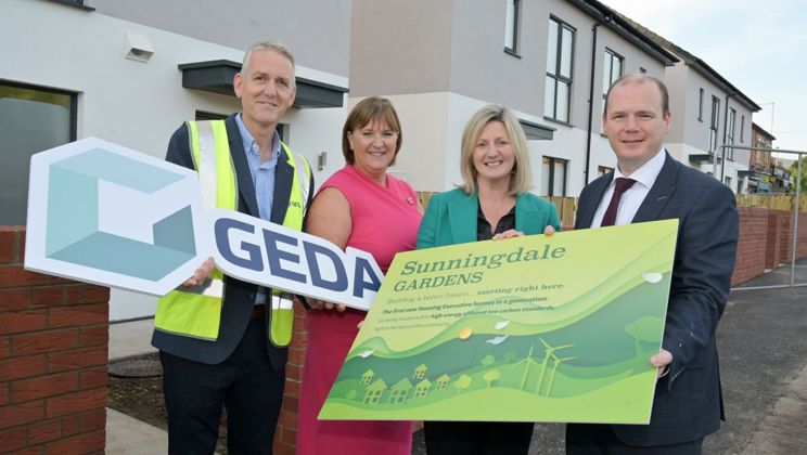 Minister for Communities Gordon Lyons (right) joined Housing Executive Chief Executive Grainia Long (second right), Housing Executive Chair Nicole Lappin (second left) and GEDA's Director of Construction Damian Murray as six, brand new homes, the first built by the housing body in a generation, are readied for allocation to tenants in north Belfast.