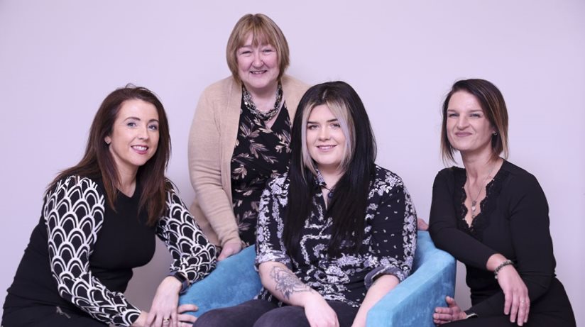 Rayanne Dooley (seated), who has been undergoing counselling, is encouraging other Housing Executive tenants to take up the offer of free sessions. First Housing charity has received funding from the Housing Executive for the service for two years. Also pictured (l-r) are Annette McCartney, Housing Executive, Maria Thompson, First Housing, and counsellor Donna Megraw.