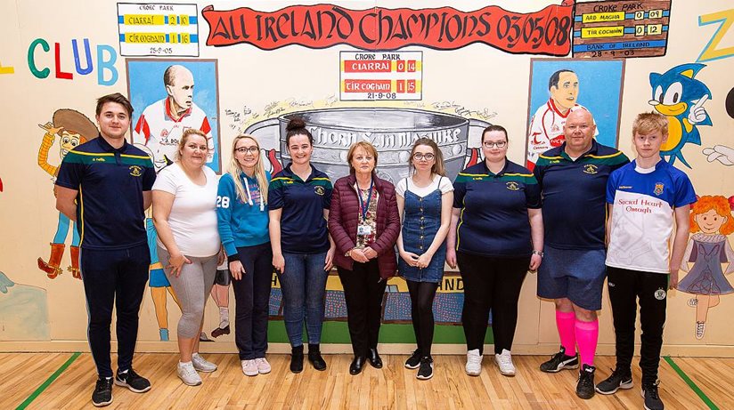 Edith Bell (centre) from Omagh Local Office was delighted to attend the celebration event in Strathroy Community Centre.