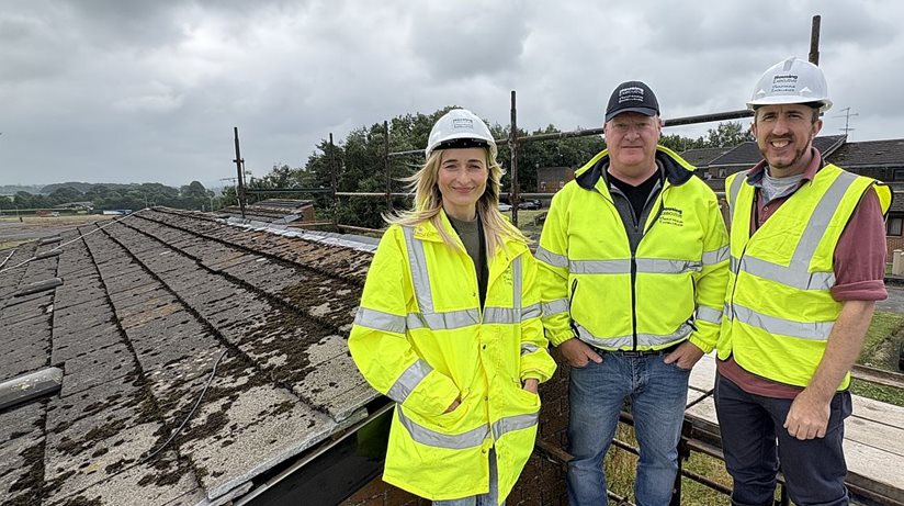Pictured on the roof of a Housing Executive pilot project in Drumtara, Ballymena are, from left, Sharon Poots, Housing Executive Architect and Senior Project Manager, Paul Fishwick, Maintenance Manager for Housing Executive Direct, North Belfast and Gareth Walsh, Housing Executive Project Manager.