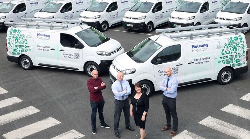 Housing Executive Chair Nicole Lappin inspects the organisation’s new fleet of 10 electric vans along with staff members David Roe, Fleet Support Operations Manager, Stephen Moore, Assistant Director of the Direct Labour Organisation (DLO), and John Lamont, DLO Operations.