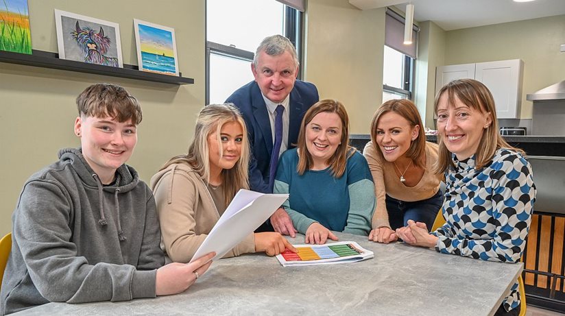 The Housing Executive awarded a £50k grant to Lisburn YMCA to help young people sustain their tenancies. Looking over projects in the current scheme are (left to right) Amie McCormack and Kelsey McKibben, service users, Des Marley, Housing Executive, and Anna Kissick, Nikki McTaggart and Pauline McMullan, all YMCA. The closing date for the next tranche of grants is Friday, October 20. 
