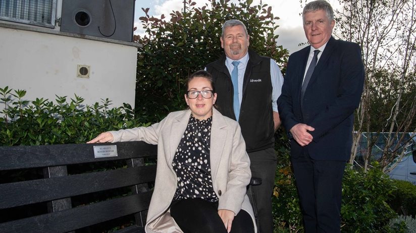 Scarlett Rossborough’s mum Carolanne Rogers (seated) is joined by Victor Watson (left), Contracts Manager idVerde and Roy McClean, Housing Executive Assistant Area Manager Mid and East Antrim in Scarlett’s Reflection Garden at Larne Community Care Centre.