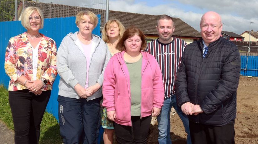 Members of Carnagat Community Association with Anita Waite and Catherine O’Hanlon from the Department for Communities and Housing Executive Area Manager Liam Gunn.