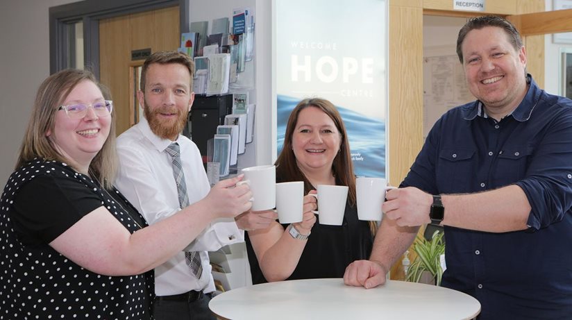 Pictured at the launch of Open Doors - a Vineyard Compassion Sustaining Tenancies project providing a holistic support service to Housing Executive tenants impacted by the cost of living crisis are (left to right) Ashley Hewitt, Vineyard Compassion Support Worker, Mark Alexander, Housing Executive Causeway Area Manager, Miriam McAlister, Vineyard Compassion Programme Manager and Ricky Wright, Chief Executive, Vineyard Compassion.