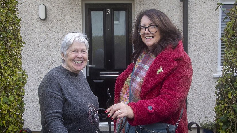 Tenant Ms. McKimm with Housing Executive Patch Manager Deirdre Taylor