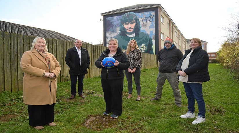 Pictured at the new George Best mural in Cregagh Estate are Amanda Ashe and Gary Ballantyne, Housing Executive, George’s sister Grace, Gemma Parker, Housing Executive, artist Dee Craig and Marlene Dodds, Cregagh Community Association