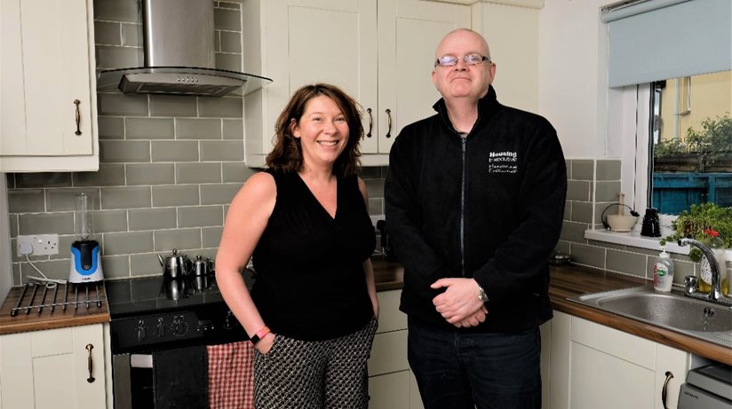 Tenant Joanne McAuley with Neighbourhood Officer, Thomas McDaid in her new kitchen.