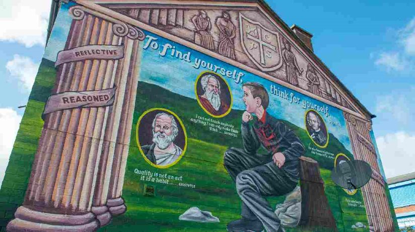 The new philosopher’s mural, funded by the Housing Executive, at the corner of Brookfield Place and Butler Walk, across from the entrance to Holy Cross Boys Primary School, Ardoyne.