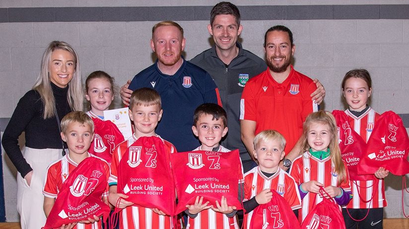 Competition winners with their prizes after successfully completing a Halloween soccer camp in Newcastle. Included is Chloe Herron, representing sponsors the Housing Executive, alongside Stoke City coaches Adam Whitmore and Tommy Booth, Newcastle FC youth coach Peter Jackson, and prizewinners Fiadh Murray, Jack O’Hare, Mason Kearney, Donal McCormick, Quinn Toner, Erin Dagen and Abbie McClure.