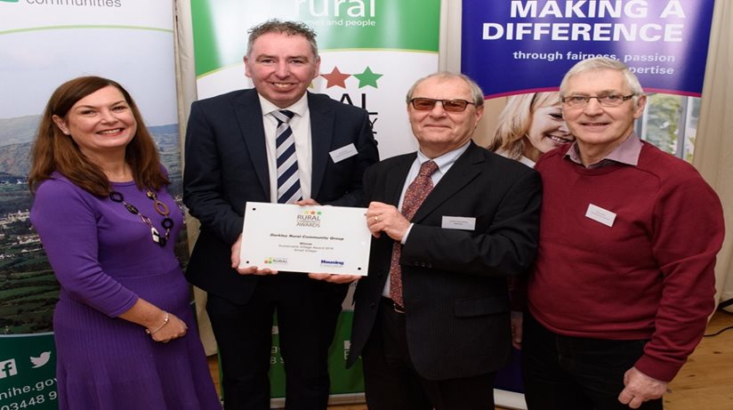 Darkley Rural Community group representatives receive their award form Chair Peter Roberts and Director Siobhan McCauley.