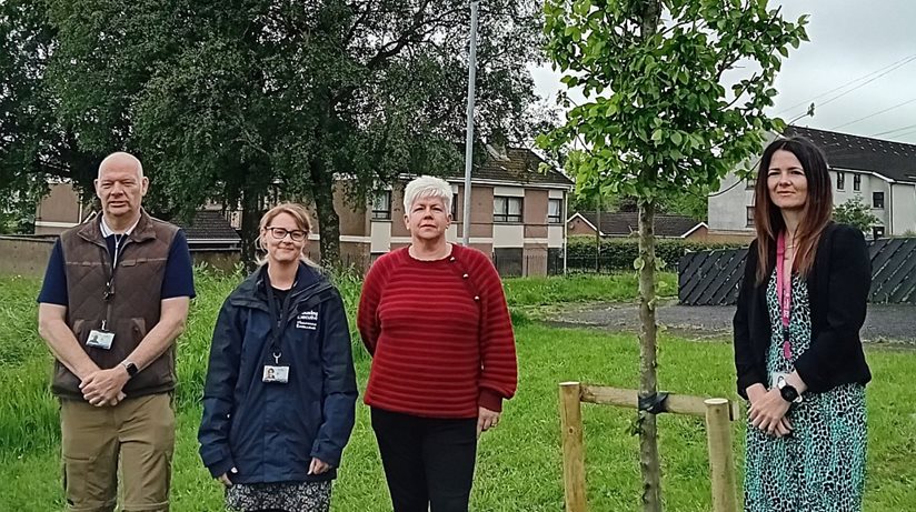 Marking sixty years of Ballykeel: (LR) The Housing Executive’s John Reid and Sabrina Mark with Rosemary McCrory and Area Manager Carolyn Crawford.