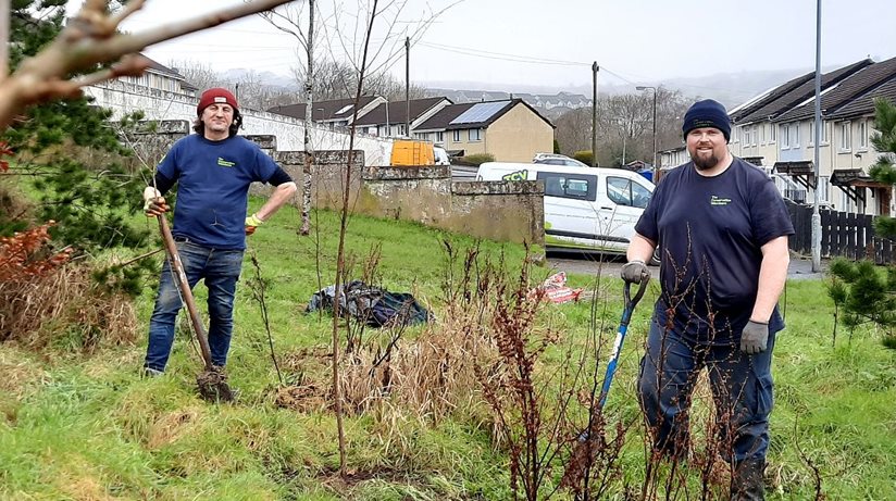 Neville and Russell from The Conservation Volunteers (TCV) plant trees at Forthriver Road Woodland, Belfast on behalf of the Housing Executive to mark the launch of its NI Energy Advice Service. 