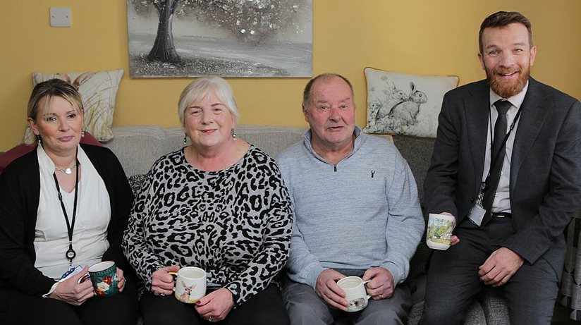 Grateful in Windyhall…Pictured inside one of the homes to benefit from a Housing Executive planned upgrade scheme worth almost one million pounds are, (from left to right), Breige Boylan, Housing Executive Patch Manager, Margaret and John Gault, Housing Executive tenants and Mark Alexander, Housing Executive Area Manager, Causeway.