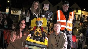 Laura Hart and Sean Murphy, NIHE patch Managers with Daragh, the Transformer, (Best Dressed winner under 12s)