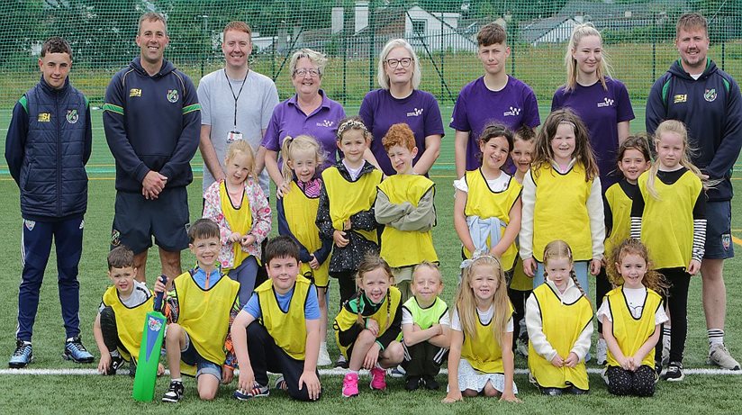 Pictured are facilitators from Northwest Cricket Union, Andrew Mullan, Housing Executive Good Relations Officer, West, Geraldine Doherty and Claire McLaughlin from Hillcrest Trust and volunteers, Lewis McCourt and Kyna McGuinness. The Waterside Shared Village Summer Youth Programme received a Housing Executive community cohesion grant of £8, 465 towards their good relations summer event. 