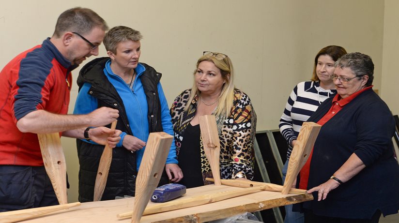 Pictured assembling their chatty bench during a Sustainable Woodwork Workshop are (from left) Gareth Dorran, Housing Executive Good Relations Officer, Causeway, Patricia McQuillan, Secretary of Moneydig Rural Network, Gareth Wright, Moneydig Rural Network, David Keys, Sustainable Wood Work, Mary Gibson, Chairperson of Moneydig Rural Network, Beverly Spillane, volunteer and Natasha Stewart.