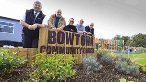 Victor Watson, Robert Titmus, Christina West, Gary Hilliar and Owen Brady stand in the new community garden