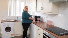 Jennah Kernohan uses her recently improved kitchen in her Housing Executive home.