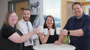 Ashley Hewitt, Mark Alexander, Miriam McAlister and Ricky Wright, enjoy cups of tea at the Vineyard Compassion Sustaining Tenancies Project.