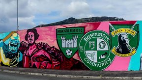 The colourful mural depicts sporting and historical figures.