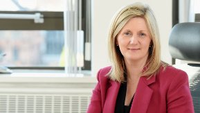 A woman in red jacket