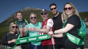 Climbers pose at foot of Errigal